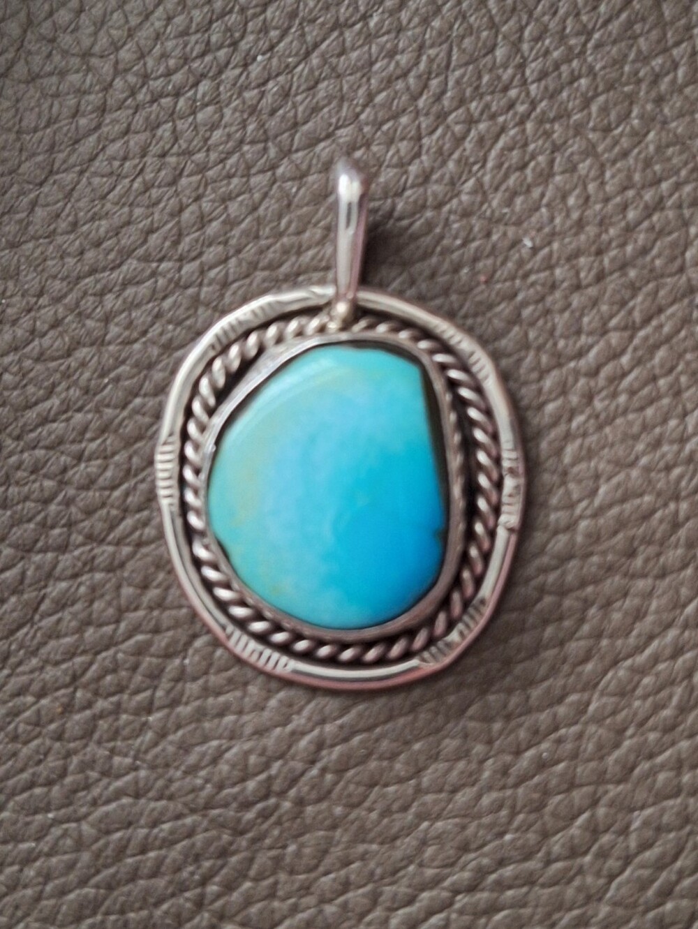 Turquoise and sterling silver pendant